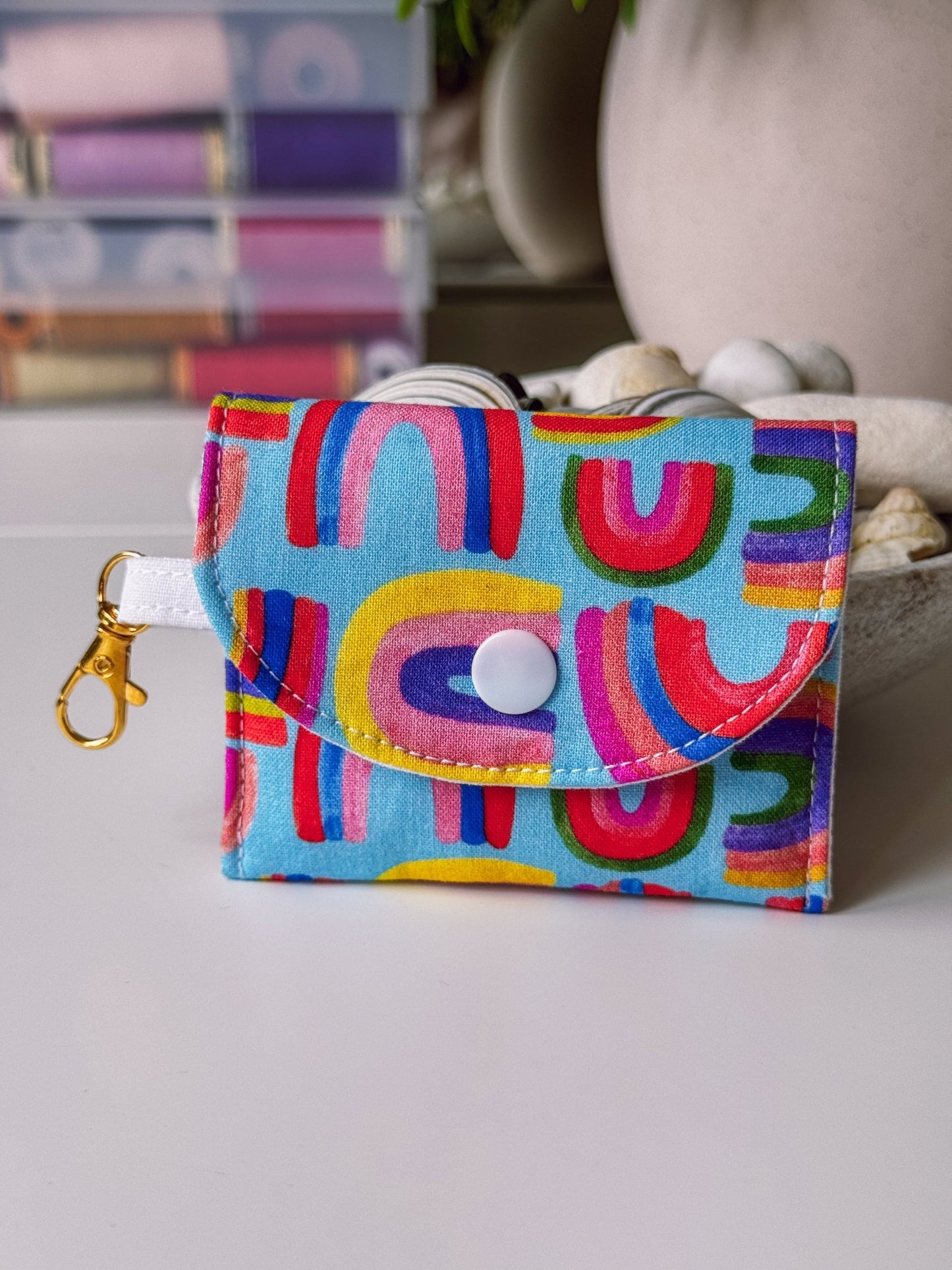 Mini Clip Case Rainbows on Blue - Ana Woods